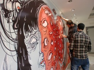 My friends are helping me to stick my work on the wall, Thanks a lot!